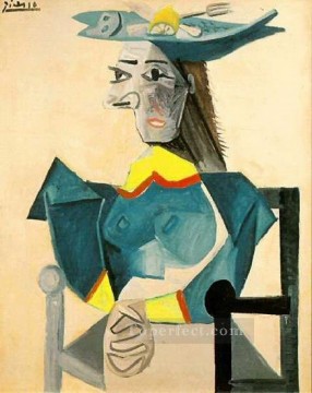  woman - Woman Sitting in a Fish Hat 1942 cubist Pablo Picasso